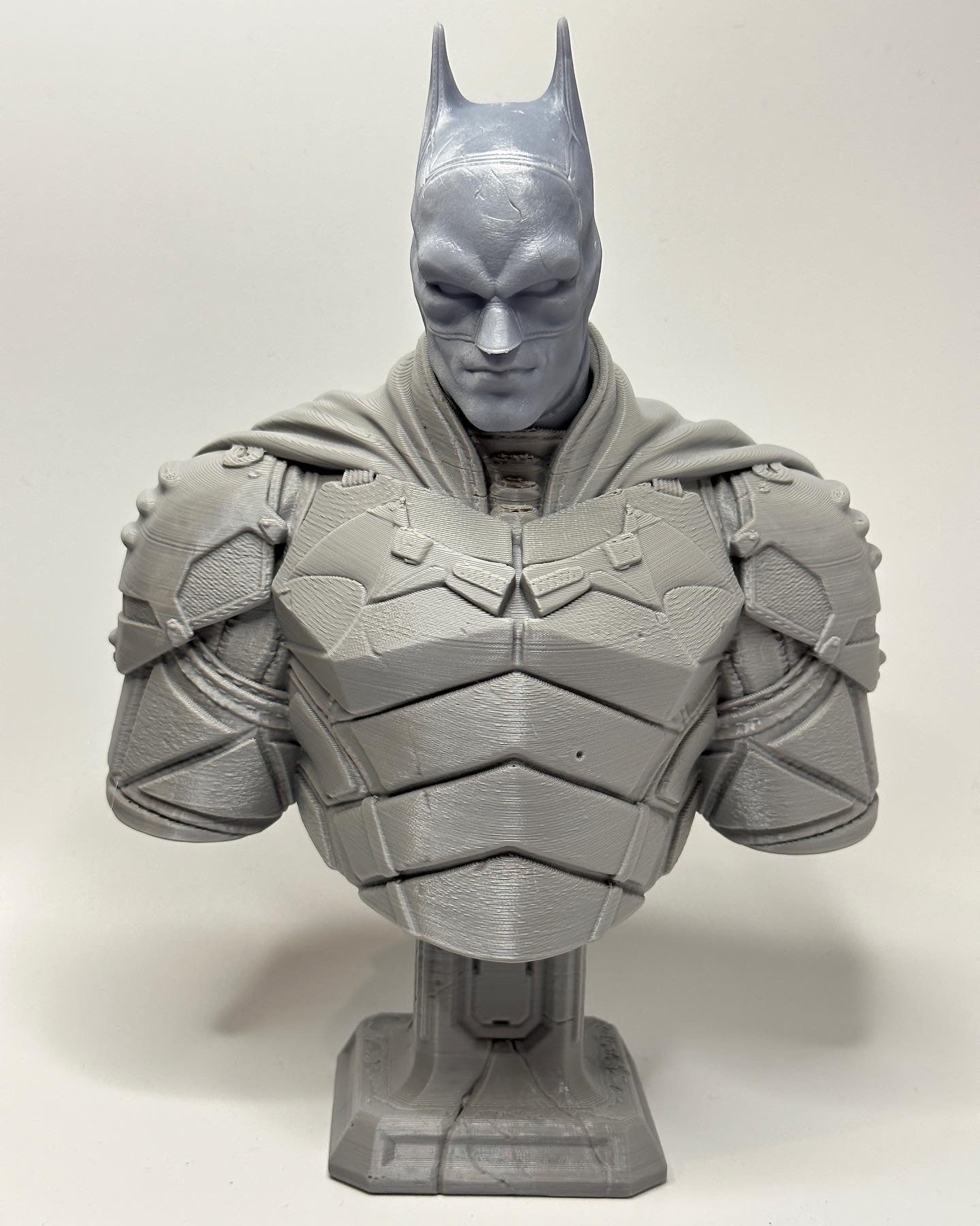 Batman and newest batman bust